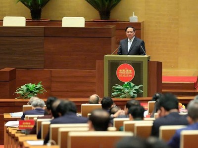 Thủ tướng Phạm Minh Chính báo cáo tại Hội nghị. Ảnh: VGP.