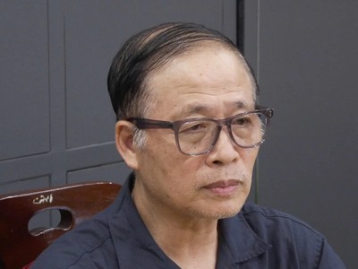 Bị can Vũ Minh Châu, nguyên Tổng giám đốc Công ty TNHH Bảo Tín Minh Châu. Ảnh: CAHN