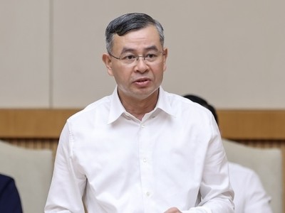 Bộ trưởng Bộ Tài chính Ngô Văn Tuấn báo cáo tại Phiên họp - Ảnh: VGP.