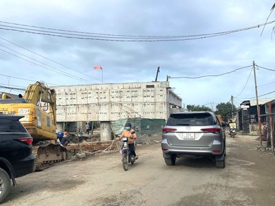Dự án cải tạo và nâng cấp quốc lộ 14E gặp vướng mắc trong công tác giải phóng mặt bằng. Ảnh: Thanh Chung