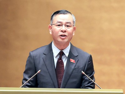 Bộ trưởng Bộ Tài chính Ngô Văn Tuấn trình bày tờ trình - Ảnh: Đức Thanh.