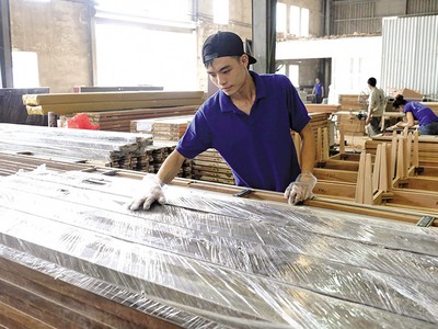 Từ gia công, sản lượng và chi phí thấp, doanh nghiệp Việt phải chuyển sang cạnh tranh bằng công nghệ, năng suất và giá trị gia tăng. Ảnh: Đ.T 