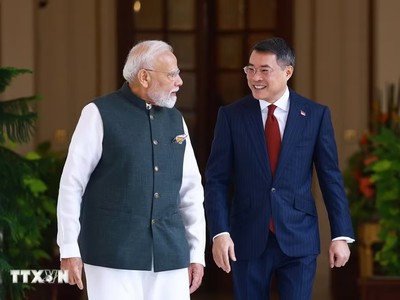 Thủ tướng Lê Minh Hưng gặp Thủ tướng Cộng hòa Ấn Độ Narendra Modi. (Ảnh: Dương Giang/TTXVN)