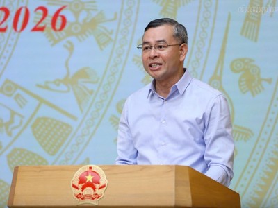 Bộ trưởng Bộ Tài chính Ngô Văn Tuấn báo cáo tại Hội nghị.