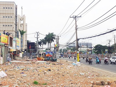 Giải phóng mặt bằng mở rộng Quốc lộ 13 là một trong những dự án có tỷ lệ giải ngân cao. Ảnh: Lê Toàn
