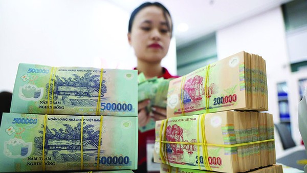 Nợ xấu ngân hàng đang có xu hướng gia tăng, trong khi xử lý nợ xấu gặp nhiều khó khăn. Ảnh: Dũng Minh 