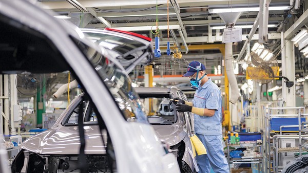 Áp lực từ môi trường bên ngoài đang buộc doanh nghiệp Việt Nam đẩy nhanh tái cấu trúc, đầu tư cho công nghệ, quản trị và phát triển bền vững