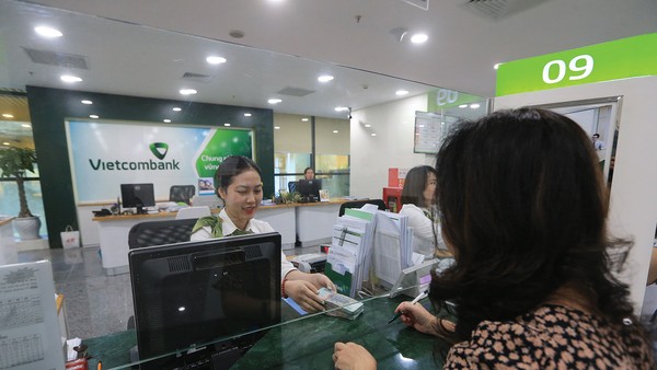 Nhóm ngân hàng quốc doanh đồng loạt báo lãi lớn năm qua