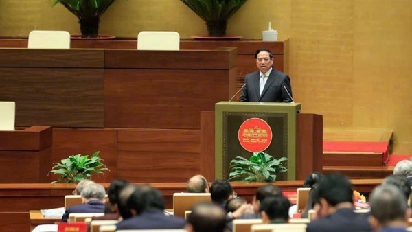 Thủ tướng Phạm Minh Chính báo cáo tại Hội nghị. Ảnh: VGP.