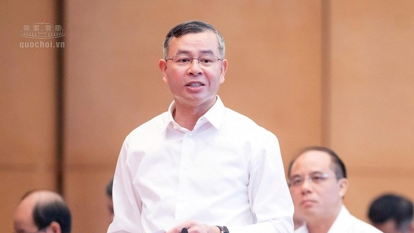 Bộ trưởng Bộ Tài chính Ngô Văn Tuấn hồi âm các vấn đề được đại biểu quan tâm - Ảnh: QH. 
