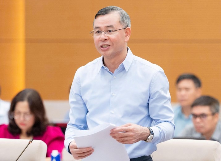 Bộ trưởng Bộ Tài chính Ngô Văn Tuấn trình bày đề xuất của Chính phủ - Ảnh: QH. 