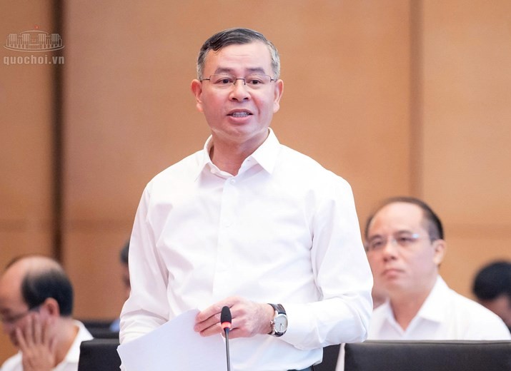 Bộ trưởng Bộ Tài chính Ngô Văn Tuấn hồi âm các vấn đề được đại biểu quan tâm - Ảnh: QH. 