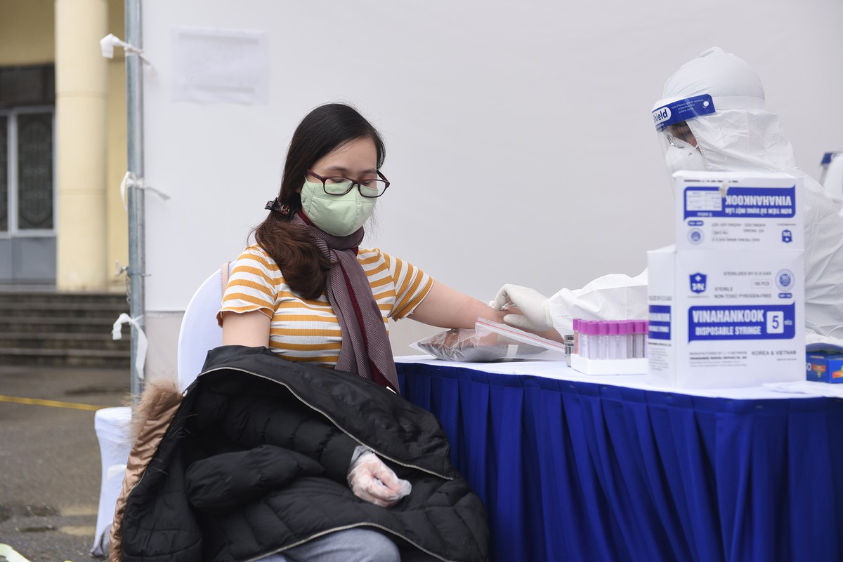 Quy trình test nhanh Covid - 19 trên diện rộng tại Hà Nội ảnh 1
