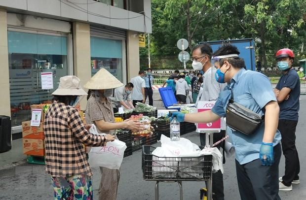 Thành phố Hồ Chí Minh tổ chức 'Phiên chợ lưu động' phục vụ người dân. (Ảnh: Quang Châu/TTXVN). Thành phố Hồ Chí Minh tổ chức 'Phiên chợ lưu động' phục vụ người dân. (Ảnh: Quang Châu/TTXVN).