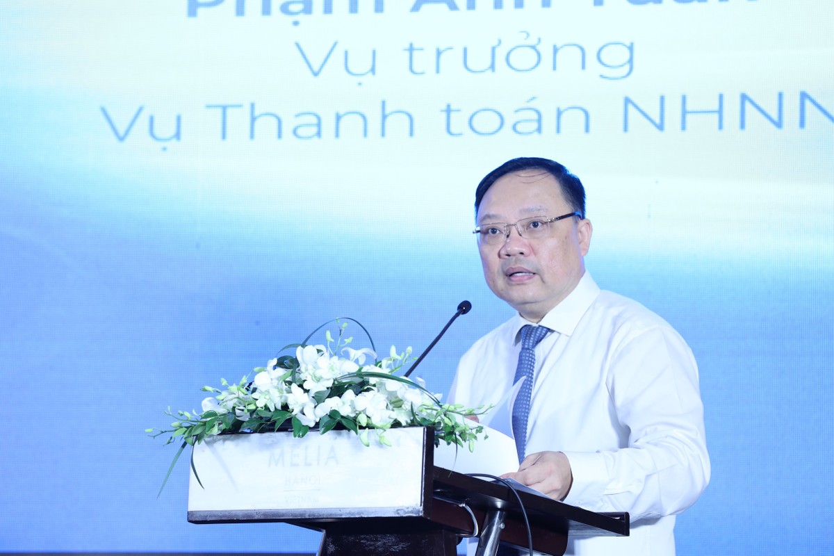 Ông Phạm Anh Tuấn, Vụ Trưởng Vụ Thanh toán, NHNN Việt Nam tham luận tại Hội thảo