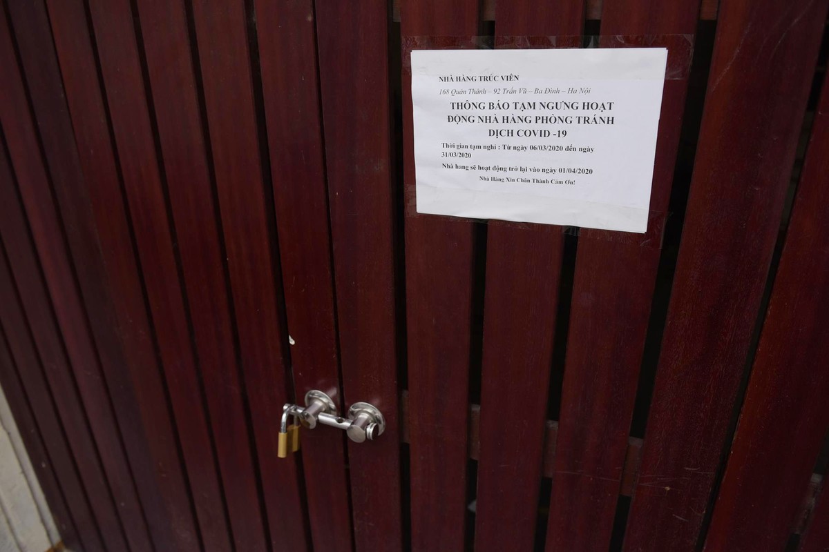 Hà Nội vắng như ngày tết, các nhà hàng, cửa hiệu đóng cửa hàng loạt vì dịch Covid - 19 ảnh 6