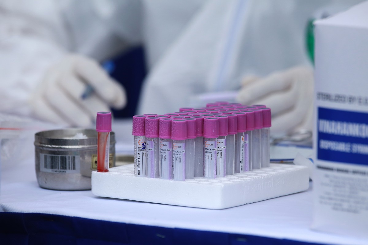 Quy trình test nhanh Covid - 19 trên diện rộng tại Hà Nội ảnh 8