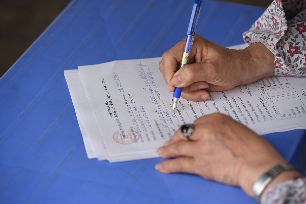 Quy trình test nhanh Covid - 19 trên diện rộng tại Hà Nội ảnh 4