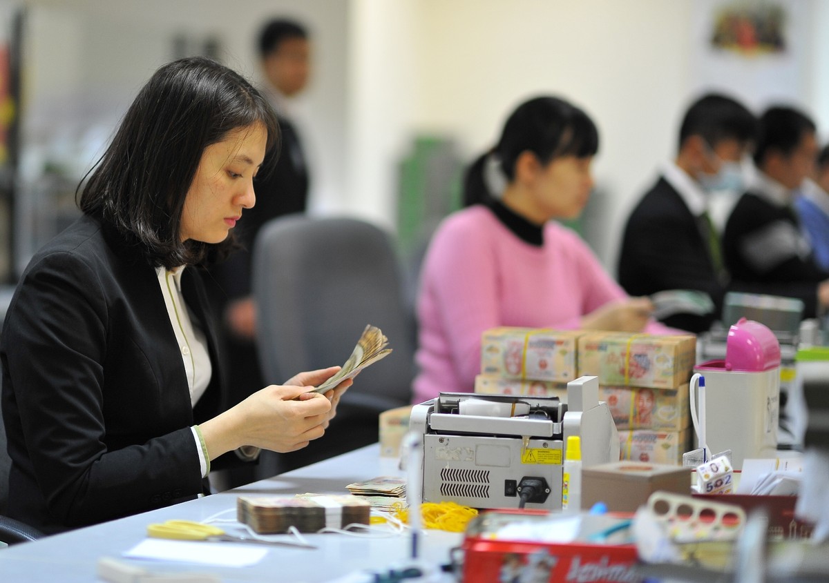 Vietcombank giải thích nguyên nhân tắc ATM dịp Tết ảnh 8