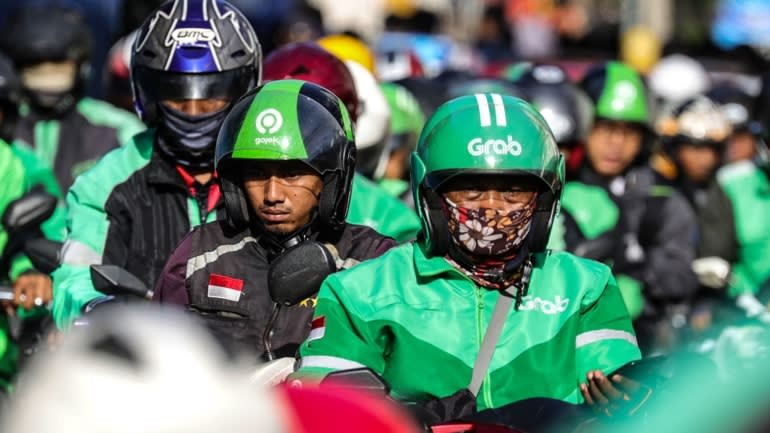 Tài xế Grab và Gojek trên đường phố Indonesia