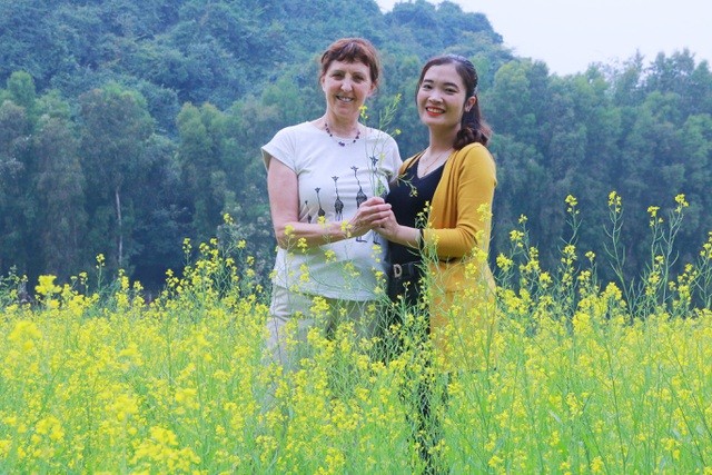 Vườn hoa cải rực vàng đẹp mê hồn khiến du khách nao lòng ở Thung Nham ảnh 19