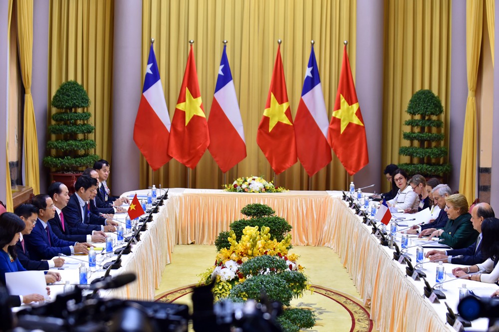 Chủ tịch nước Trần Đại Quang đón Tổng thống Chile Michelle Bachelet ảnh 2