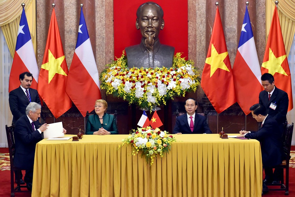 Chủ tịch nước Trần Đại Quang đón Tổng thống Chile Michelle Bachelet ảnh 4