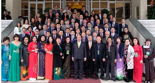 Thủ tướng chia sẻ khát vọng đưa nền kinh tế thành 'con hổ mới' với kiều bào ảnh 1