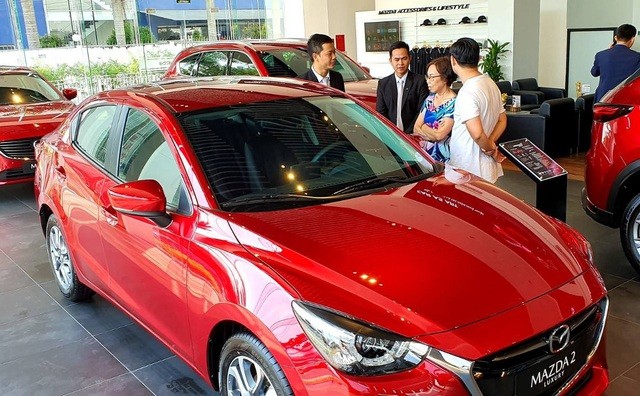 Ô tô tăng giá từng ngày sau khi chốt giảm 50% lệ phí trước bạ ảnh 1