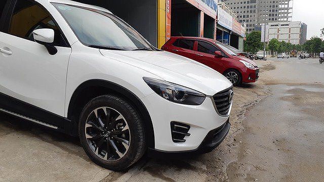 Dân buôn xe cũ "ngậm đắng", lỗ tiền triệu mỗi ngày vì xe mới giảm giá đồng loạt ảnh 2