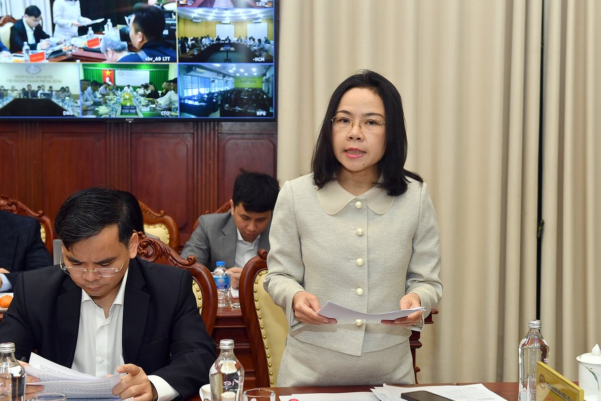 Bà Hà Thu Giang, Vụ trưởng Vụ Tín dụng các ngành kinh tế, Ngân hàng Nhà nước phát biểu tại Hội nghị.