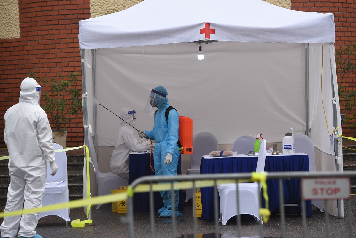 Quy trình test nhanh Covid - 19 trên diện rộng tại Hà Nội ảnh 14