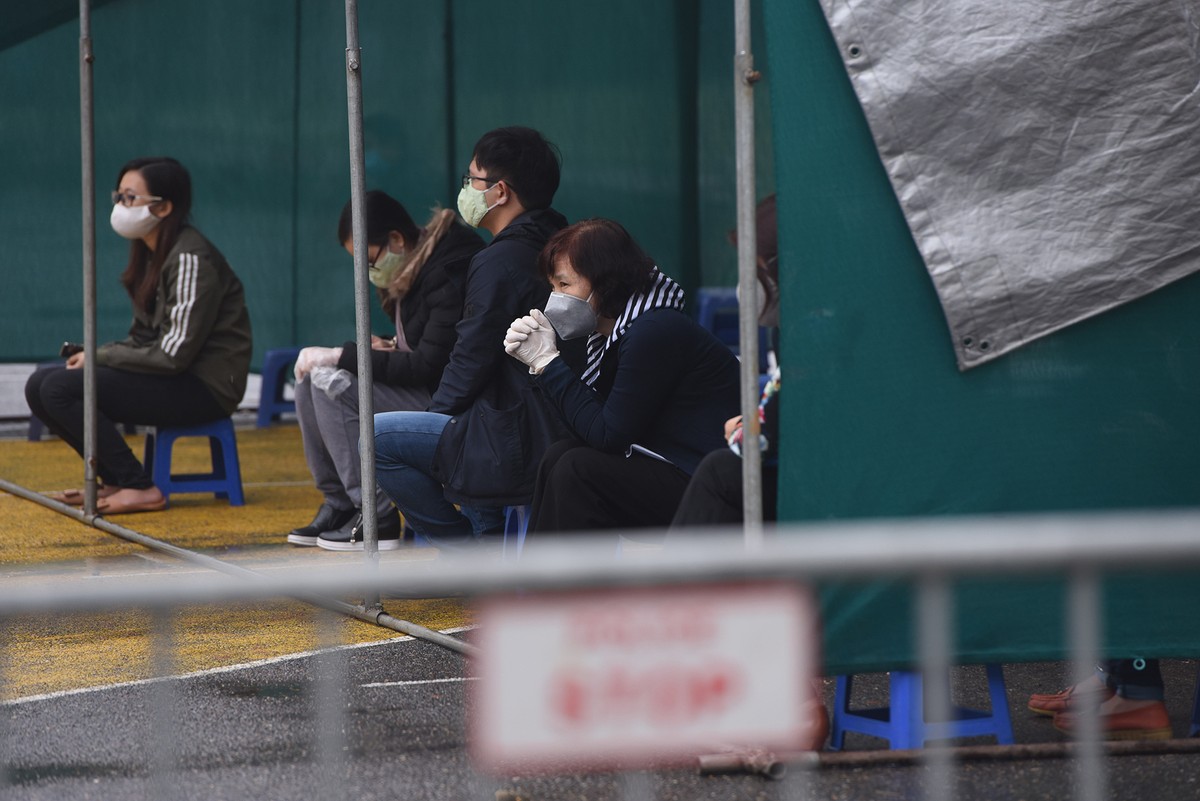 Quy trình test nhanh Covid - 19 trên diện rộng tại Hà Nội ảnh 11