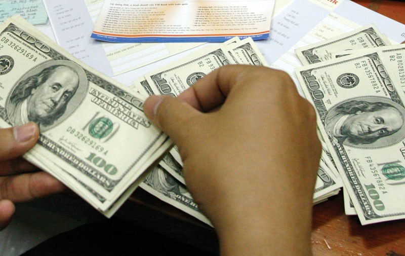 Sức ép lãi suất VND tăng lên sau quyết định của Fed ảnh 1