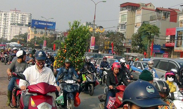 Người dân đổ về quê ăn Tết, cửa ngõ Hà Nội ùn tắc nghiêm trọng ảnh 11