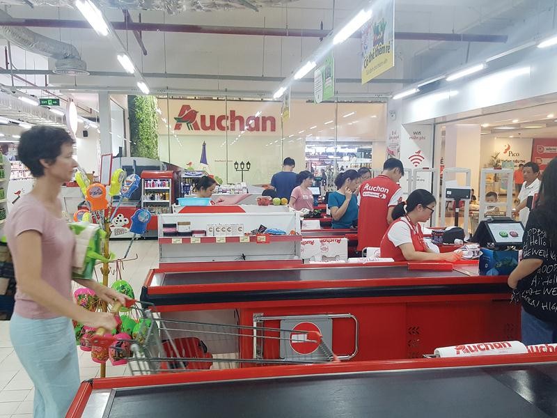 Áp lực cạnh tranh nóng bỏng từng giờ, bán lẻ ngoại thoái lui ảnh 1