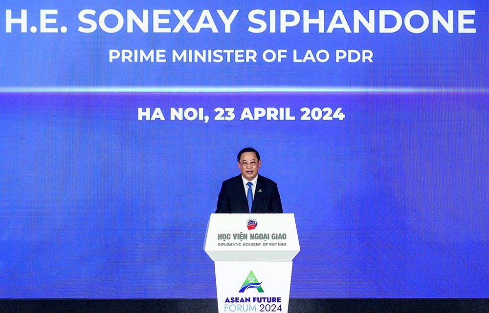 Thủ tướng Lào Sonexay Siphandone phát biểu tại lễ khai mạc Diễn đàn. (Ảnh: Đức Thanh)