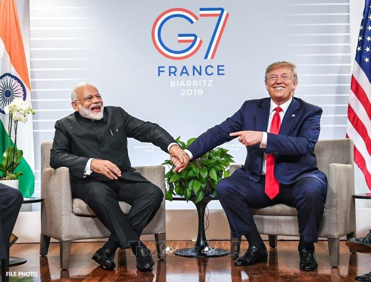 Thủ tướng Ấn Độ Narendra Modi (bên trái) và Tổng thống Mỹ Donald Trump trong một cuộc gặp năm 2019 khi ông Trump trong nhiệm kỳ đầu tiên. Ảnh: ANI/TTXVN