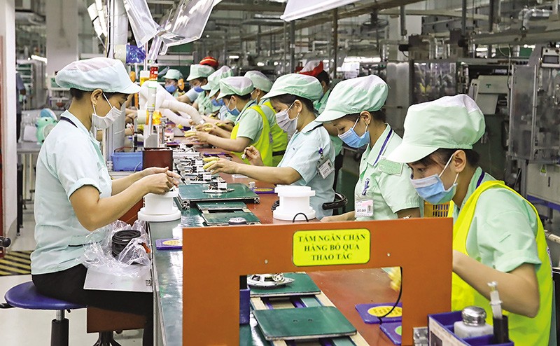 Khu vực sản xuất của Công ty Điện tử Foster tại Khu công nghiệp VSIP Bắc Ninh. Ảnh: Đức Thanh Khu vực sản xuất của Công ty Điện tử Foster tại Khu công nghiệp VSIP Bắc Ninh. Ảnh: Đức Thanh