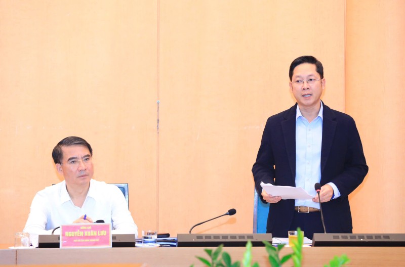 Giám đốc Sở Tài chính Hà Nội Nguyễn Ngọc Tú báo cáo tại hội nghị.