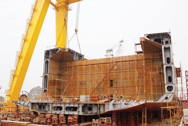 Tìm chiếc áo pháp lý cho DN nhà nước ảnh 1 Tìm chiếc áo pháp lý cho DN nhà nước ảnh 1