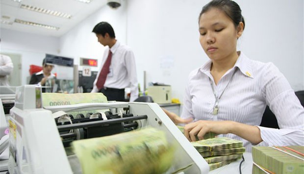 Lãi suất huy động có thể giảm thêm 1% ảnh 1