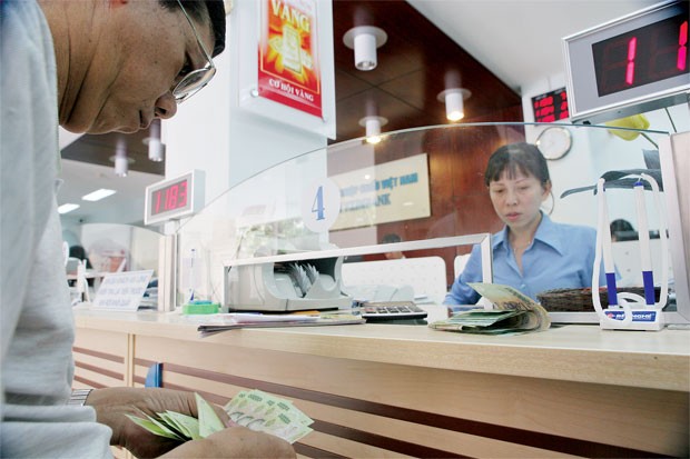 Nợ xấu “rút” lợi nhuận nhà băng ảnh 1