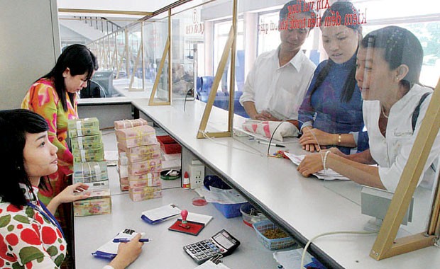 Thu ngân sách về đích, DN thêm sức ép? ảnh 1