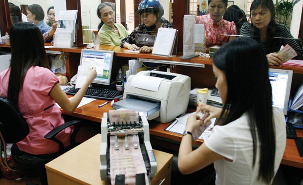 Sốt sắng yếu tố ngoại trong tái cấu trúc ngân hàng ảnh 1