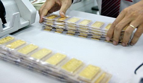 Khó hút tiền đồng, ngân hàng tăng huy động vàng ảnh 1