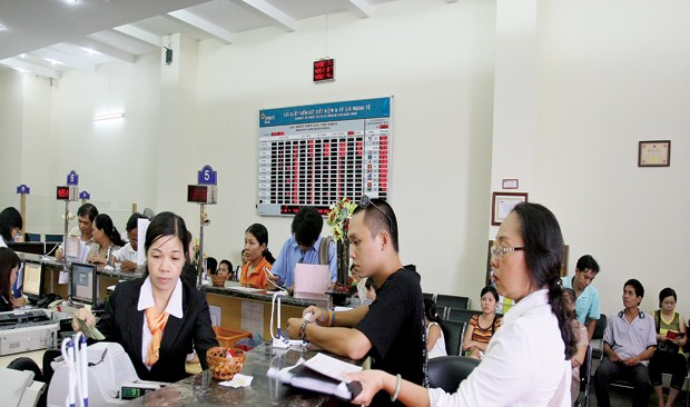 Hạ trần lãi suất, huy động chưa phản ứng  ảnh 1