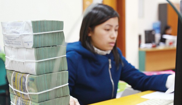 Hạ lãi suất nhưng cung tiền vẫn bị “bóp nghẹt” ảnh 1