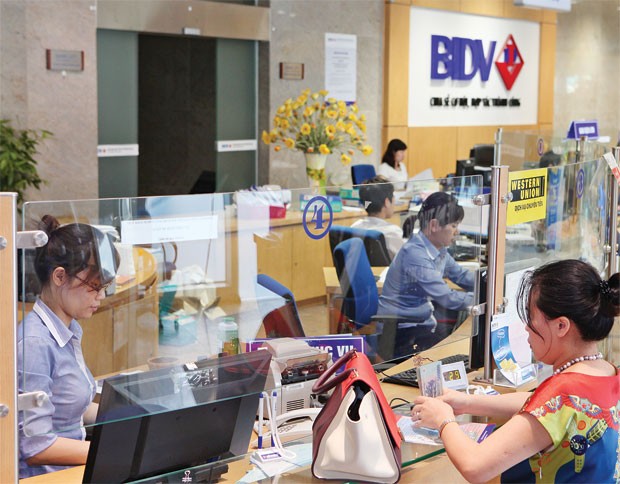 Lãi suất cho vay hạ nhỏ giọt ảnh 1