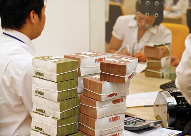 Khó hạn chế tình trạng lách trần lãi suất ảnh 1